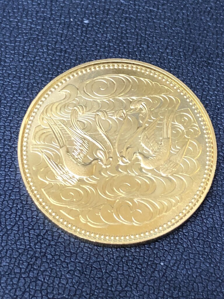 天皇陛下御在位60周年 10万円金貨